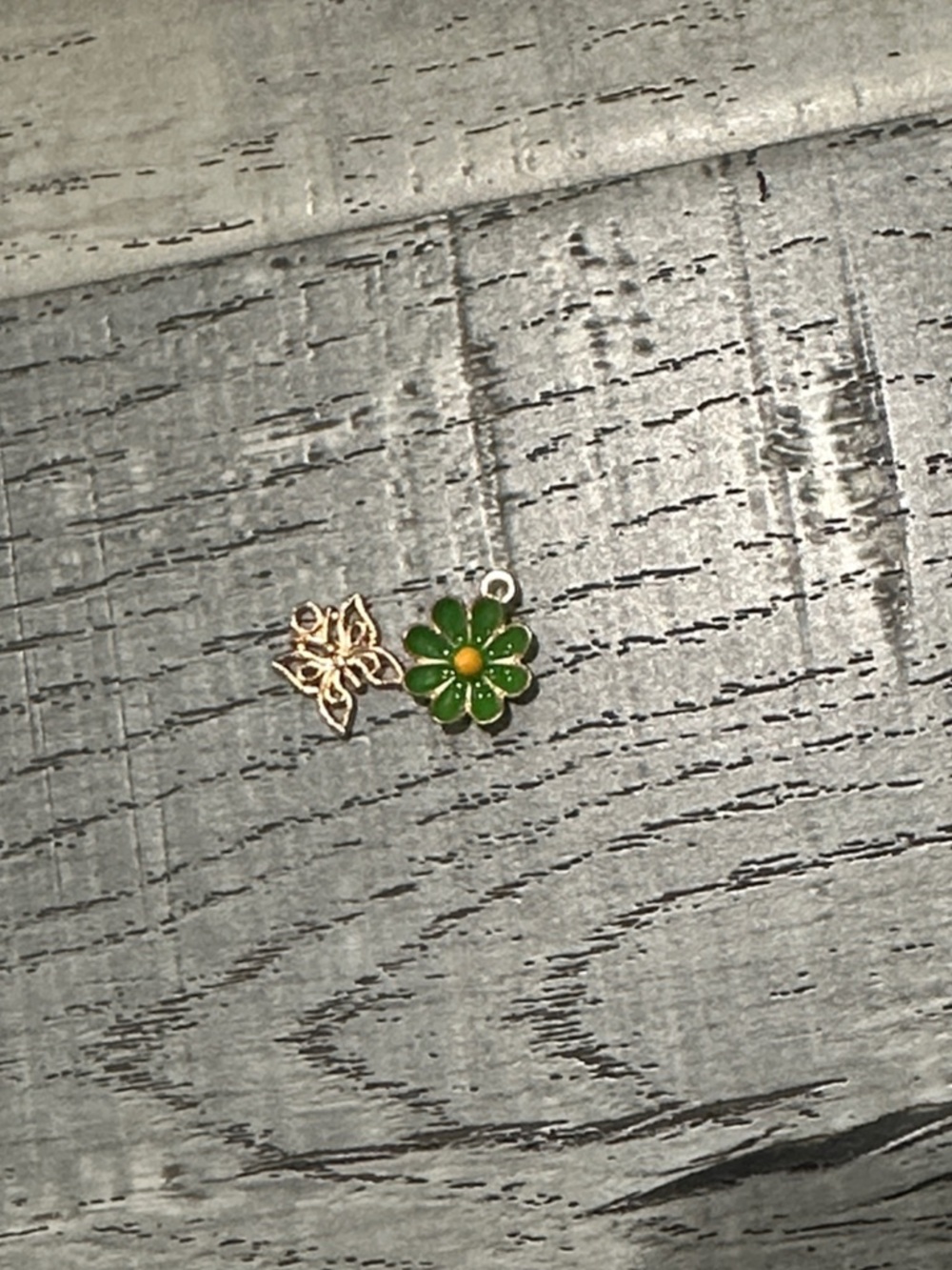 Butterfly and flower charm